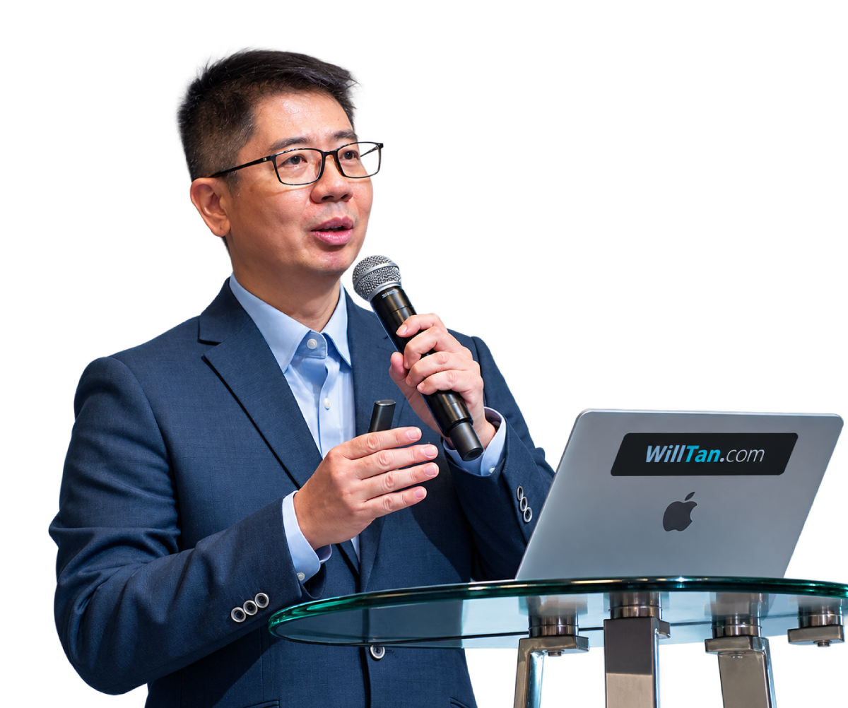 Will Tan speaking with a microphone beside his laptop